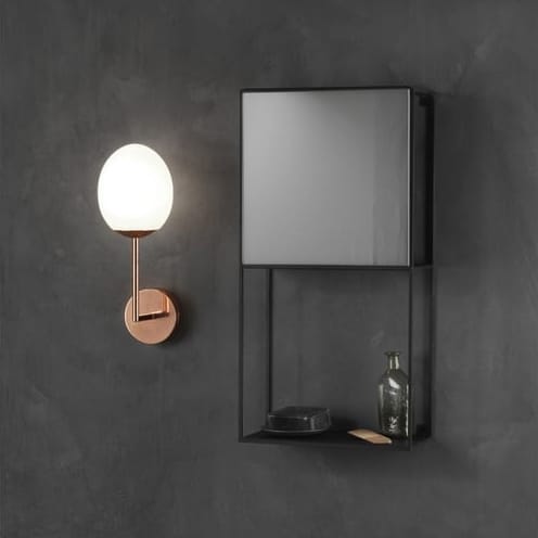 KIWI Bathroom LED Wall Light Polished Copper A great wall light in a shiny copper finish with an elegant spheroid opal glass shade. This is ideal to add to bathrooms where copper is a feature and would also work well in other rooms throughout the home.