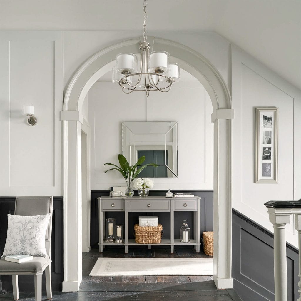 Southwell is contemporary 5 light pendant with opal glass shades, curved polished nickel arms