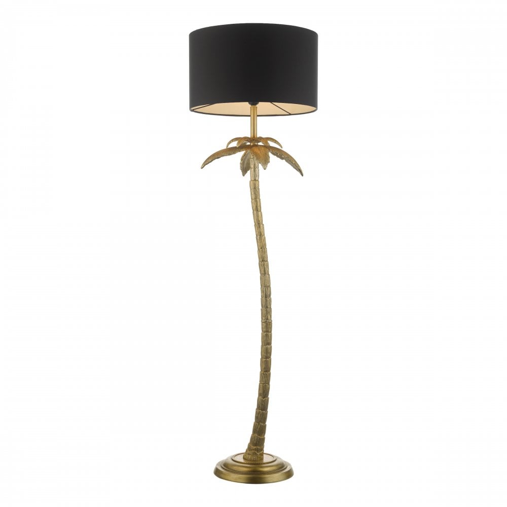 An antique gold floor lamp that has been styled on a palm tree. The lamp stand has a curved style and has