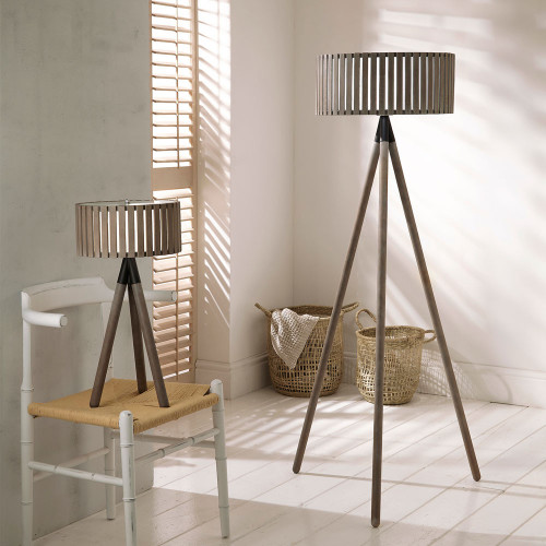 wooden slatted table and floor lamp with tripod base