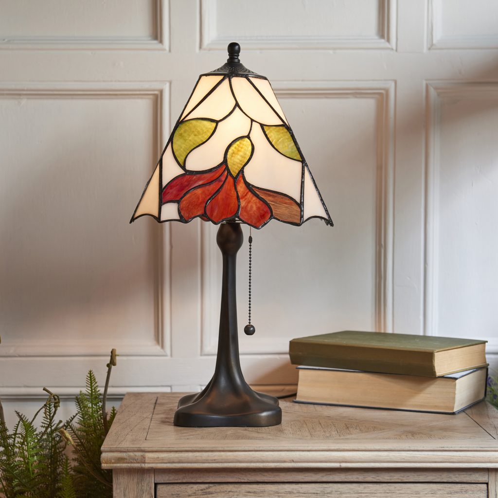 tiffany style table lamp with red flower