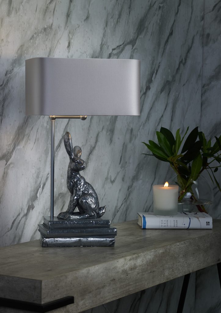 hare sat on books pewter table lamp