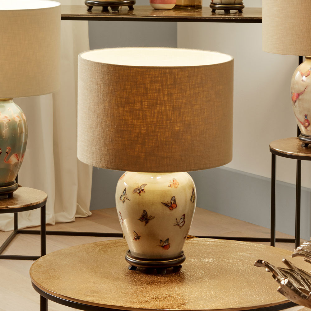 glass table lamp hand decorated with butterflies with taupe drum shade