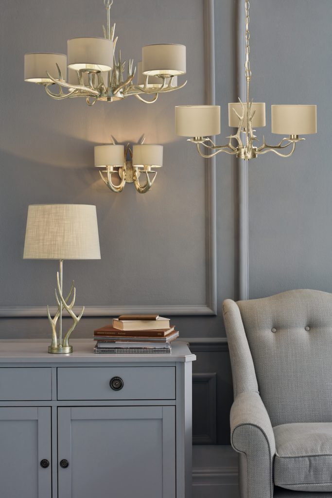 antler chandeliers with champagne finish with matching antler wall light and matching antler table lamp