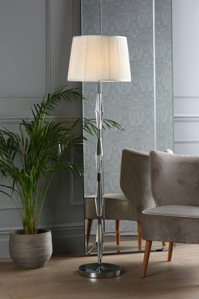glass floor lamp with white pleated shade
