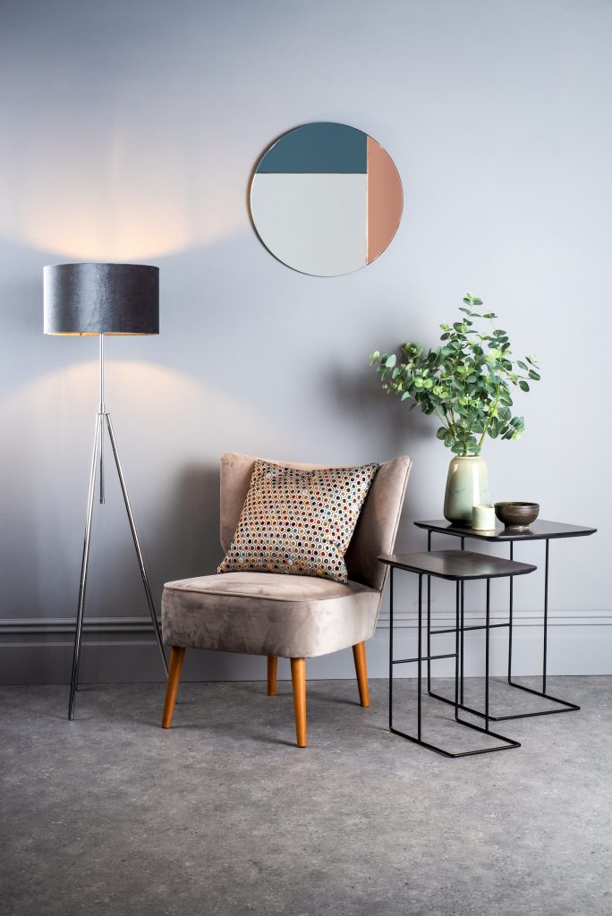 velvet drum shade on a tripod floor lamp base 