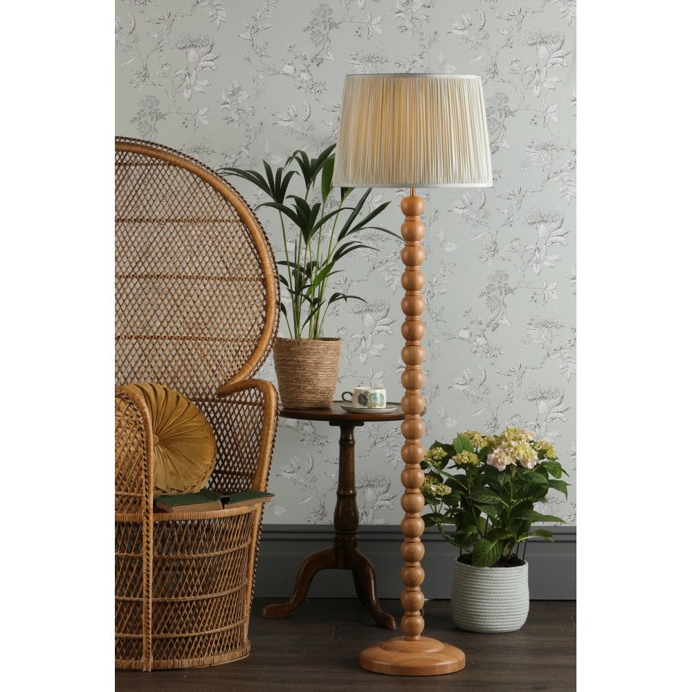 wooden bubble floor lamp with cream pleated shade