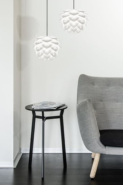 large artichoke shaped white ceiling shades