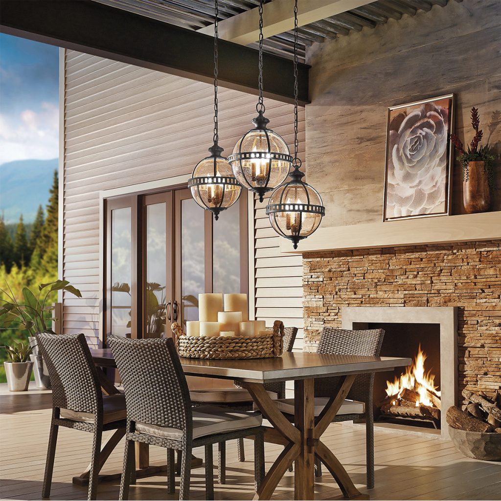 outdoor hanging pendants in a cluster over dining table
