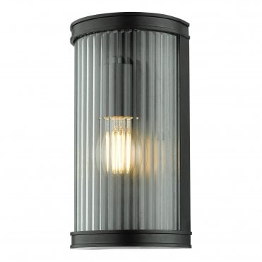 matte black wall light with curved ribbed glass front