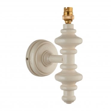 white wooden spindle wall light
