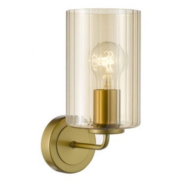 satin gold wall light with ribbed amber glass shade