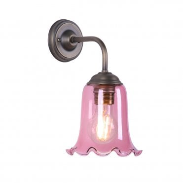 Wall light in antique brass with pink glass shade