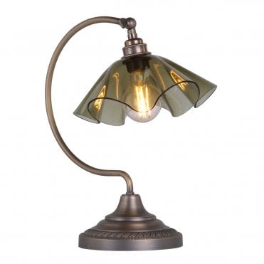 Table lamp in antique brass with moss green glass shade