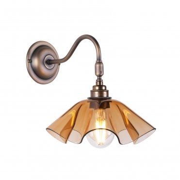 amber curved stained glass and antique brass wall light