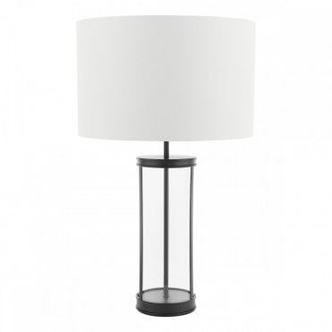 large black cage table lamp with glass and white drum shade