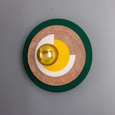 metal and ceramic disc wall light with green, yellow and white geometric layers