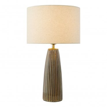 a large oversized brown table lamp with ivory linen shade