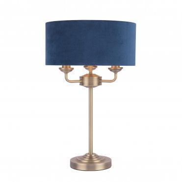 Laura Ashley SORRENTO 3 Light Table Lamp Antique Brass & Blue Shade switched on
