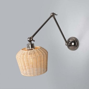 Antique silver wall light with natural rattan shade