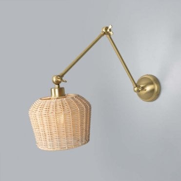 satin brass adjustable arm wall light with rattan shade