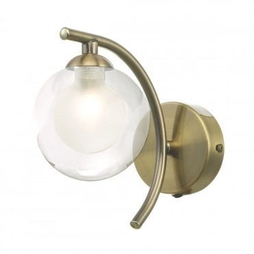 curved brass wall light with double layered clear and opal glass shade