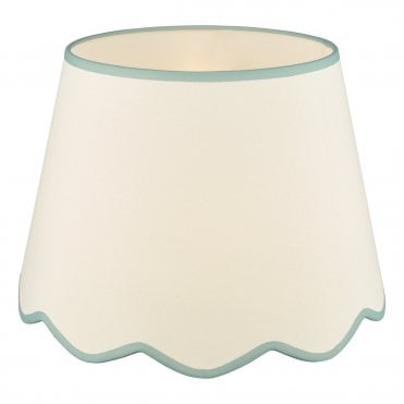 A large, neutral scallop shade lamp shade with blue edge detail