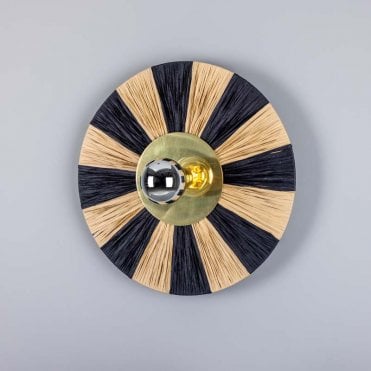round wall light made from sustainable materials with black stripes
