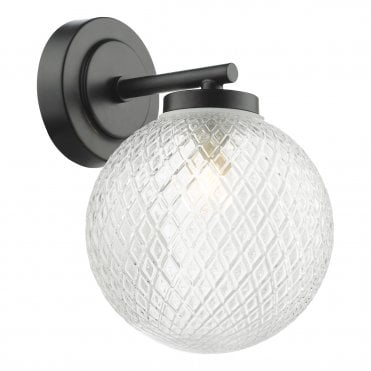 Matte black bathroom wall light with textured glass globe shade