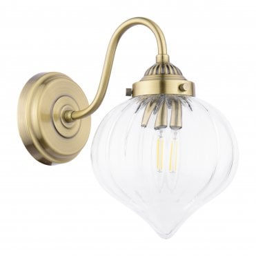 antique brass wall light with ribbed glass shade